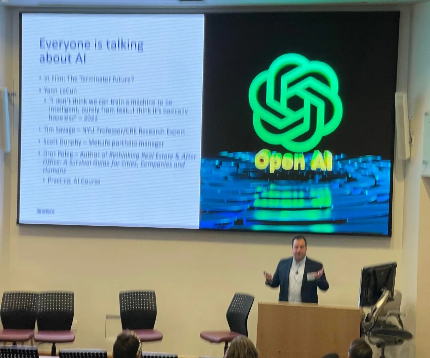 Chris presenting at the PREA Institute in front of a slide titled Everyone is talking about AI